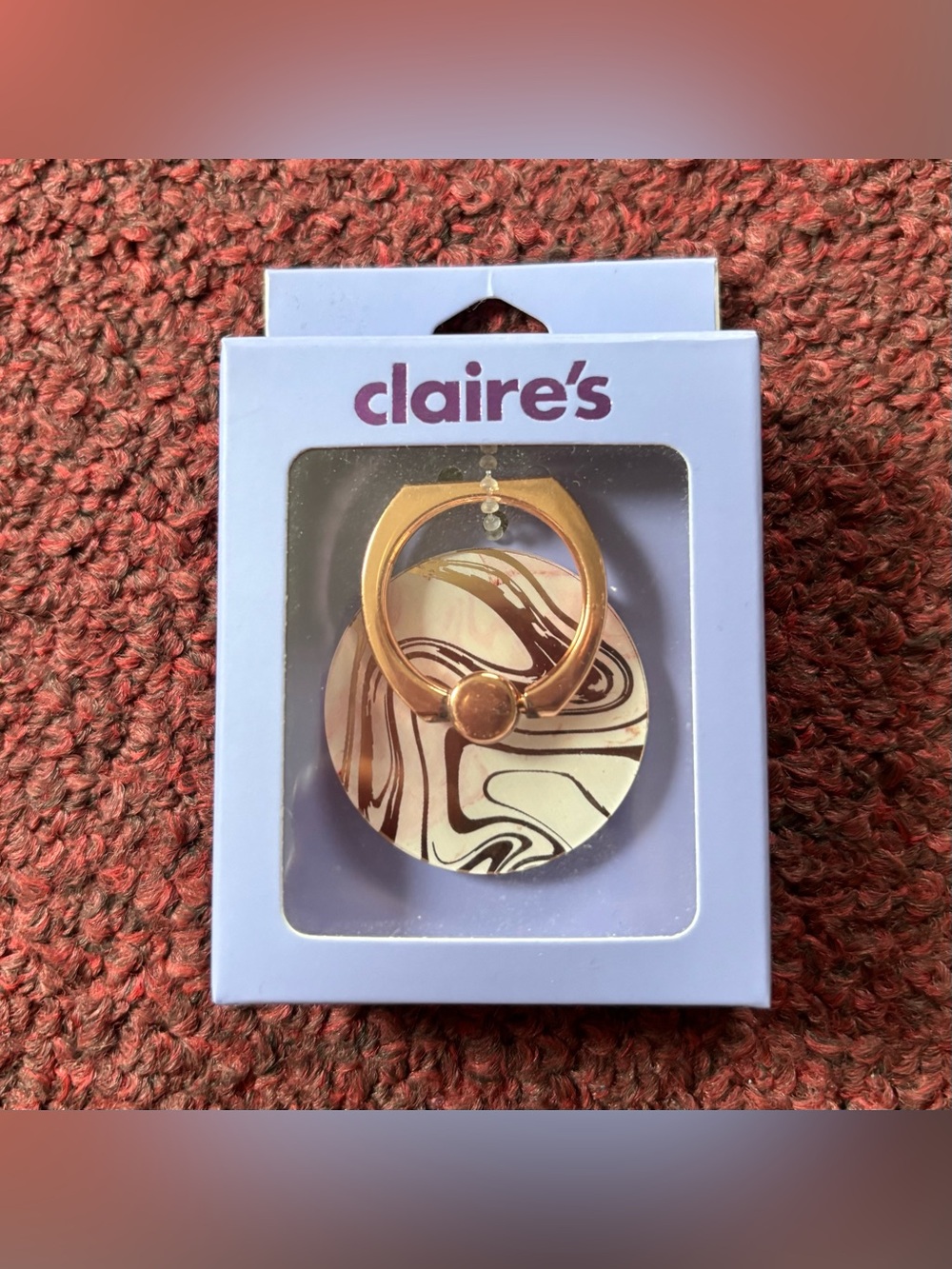 Claire’s adhesive phone ring grip